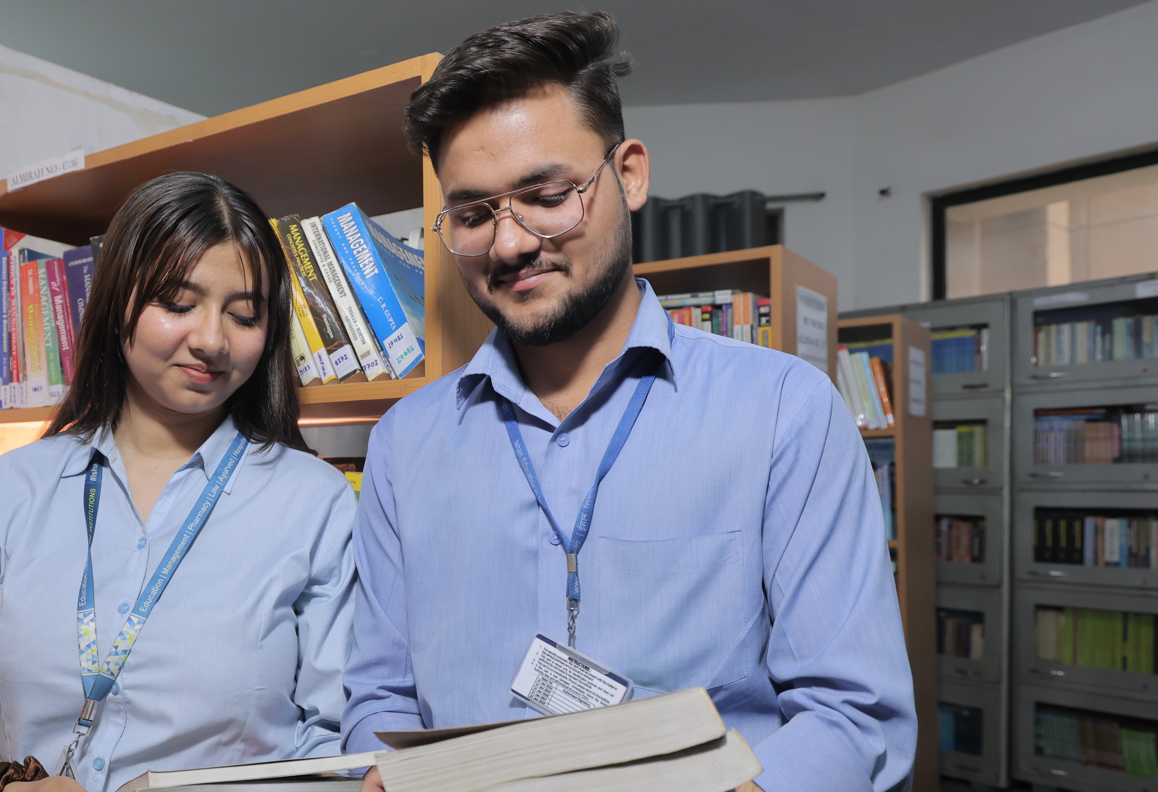 Library book collection on shelves